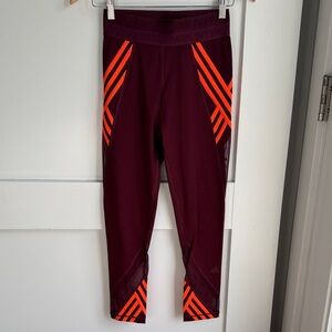 adidas Ivy Park Burgundy Leggings with Neon Orange Stripe Accents